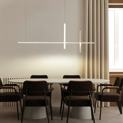 Avery pendant light by Residence Supply, modern ceiling fixture with a sleek design and warm metal finish, hanging from the ceiling.