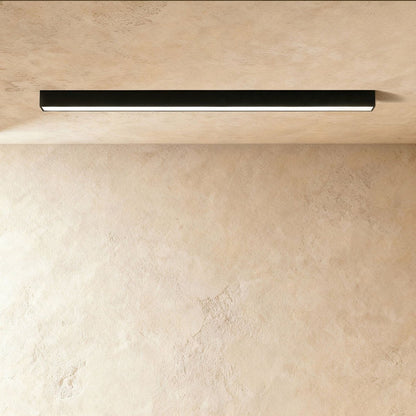Azora Ceiling Light by Residence Supply featuring a sleek modern design with a white shade and metallic accents.