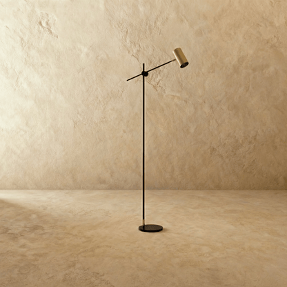 Bellis Floor Lamp by Residence Supply with a sleek modern design and a tall standing structure for ambient lighting.