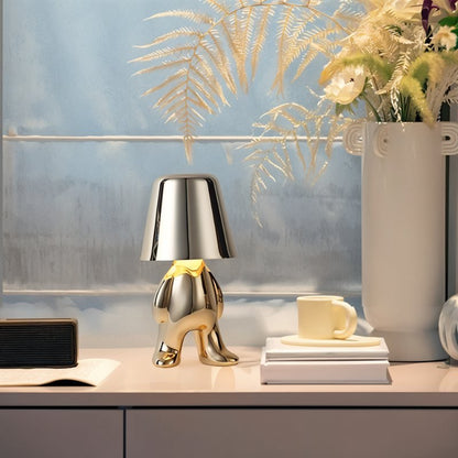 Carine table lamp by Residence Supply with a sleek modern design and beige fabric shade on a wooden base.