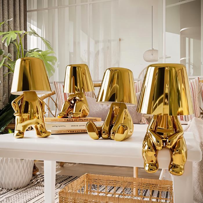 Carine Table Lamp by Residence Supply with a sleek modern design and a neutral-colored lampshade on a wooden base.