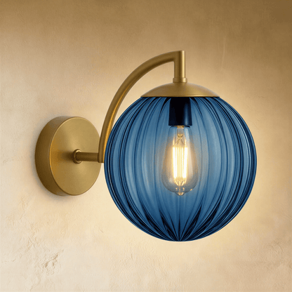 Carissa Wall Lamp by Residence Supply featuring a sleek modern design with a curved arm and fabric shade for interior lighting.
