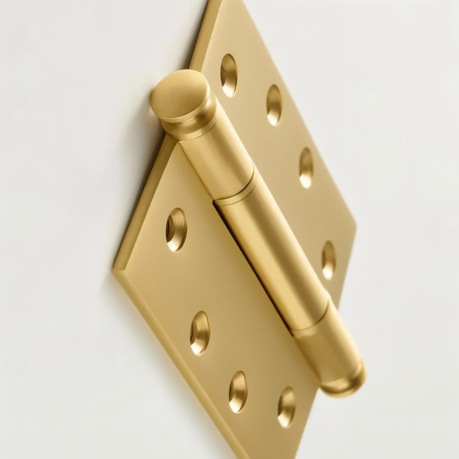 Close-up of a Carvin door hinge showcasing durable metal construction for residential door installation.