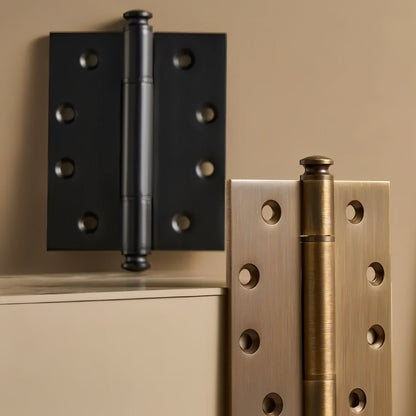 Close-up of black antique Carvin door hinge by Residence Supply, showing detailed metal craftsmanship for home door hardware.