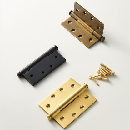 Decorative Carvin door hinges with finials, showcasing intricate metalwork and craftsmanship for classic home door hardware.