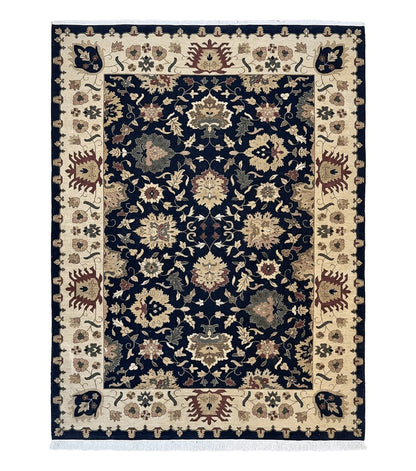 Handmade Indo Persian wool rug measuring 10x14 with floral Oriental design in black and beige, by Jewel Rugs.