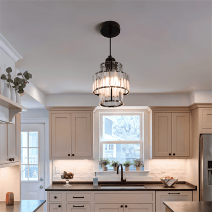 Charagh Pendant Light by Residence Supply featuring a sleek, modern design with a glass shade and metallic accents.