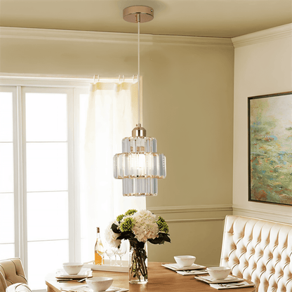 Charagh Pendant Light by Residence Supply featuring a modern design with a sleek metal finish and glass shade.