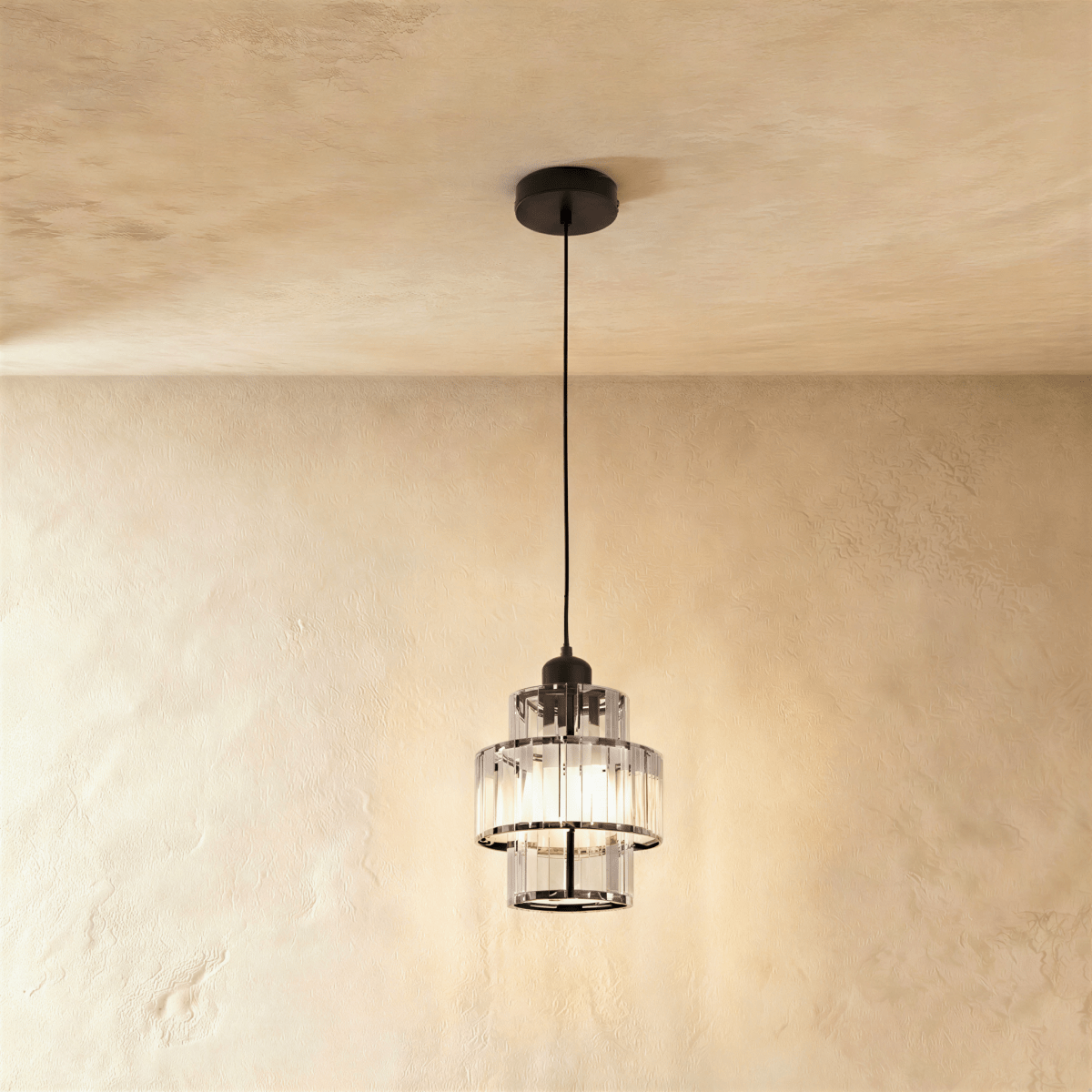 Charagh Pendant Light by Residence Supply hanging from ceiling with a sleek modern design and warm illumination.