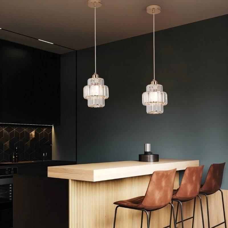 Charagh pendant light by Residence Supply featuring a modern design with a sleek metal finish and glass shade.