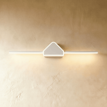 Residence Supply Clytheris Wall Lamp showing modern design with curved metal arm and sleek shade mounted on wall.