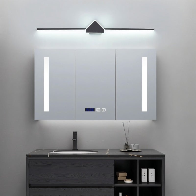 Modern Clytheris Wall Lamp by Residence Supply, black bathroom vanity light fixture with sleek design and clear glass shade.