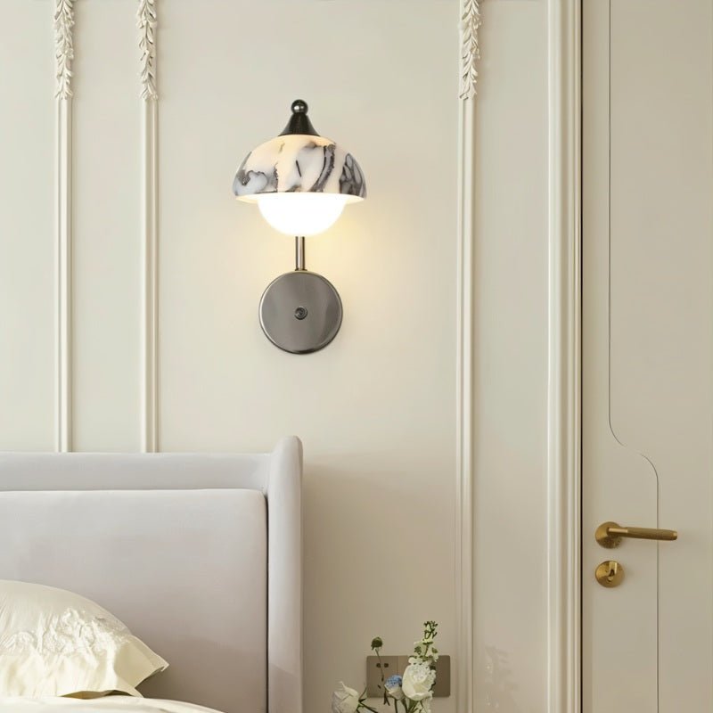 Crickle Wall Lamp by Residence Supply mounted on a wall with a sleek, modern design and warm lighting for contemporary decor.