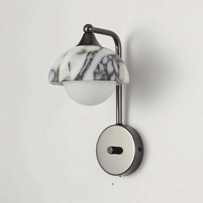 Residence Supply Crickle Wall Lamp mounted on a wall with a modern, minimalist design and warm lighting.