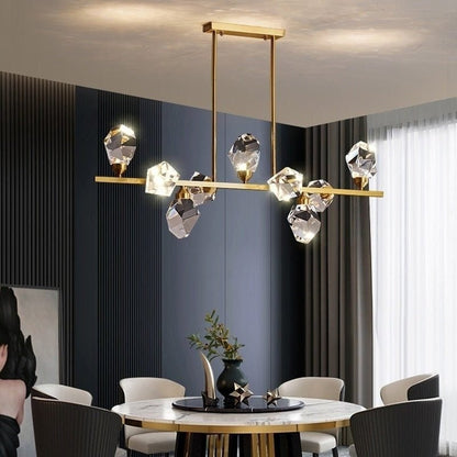 Elegant crystal chandelier by Residence Supply with hanging crystal accents and a polished metal frame, ideal for luxurious interiors.