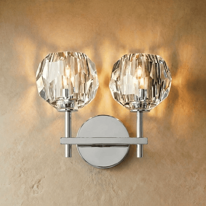 Cristo wall lamp by Residence Supply featuring a modern design with a sleek metal frame and a glass shade for ambient lighting.
