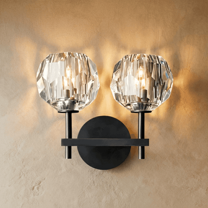 Cristo wall lamp by Residence Supply featuring a sleek, modern design with a metallic finish and adjustable arm for wall lighting.