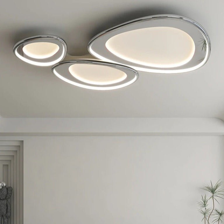 Modern Cruz ceiling light by Residence Supply featuring a sleek metal frame and clear glass shade for stylish illumination.