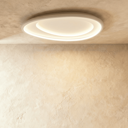 Residence Supply Cruz ceiling light fixture with a sleek modern design and metal finish, shown hanging from the ceiling.