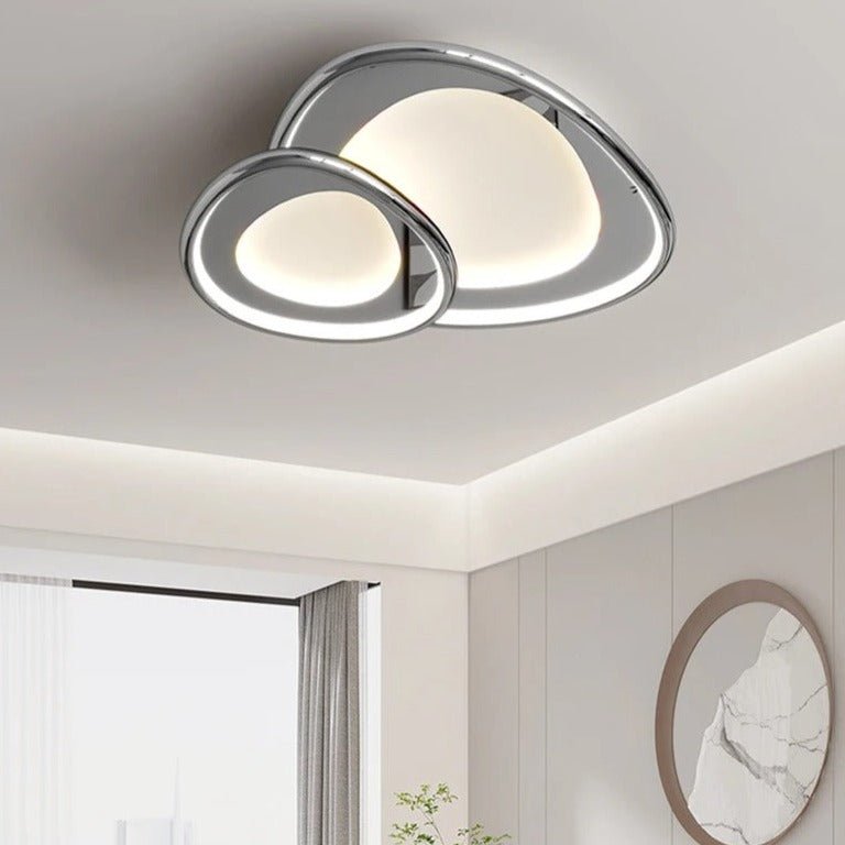 Modern Cruz ceiling light by Residence Supply with a sleek design, featuring a round metal frame and glass shade.