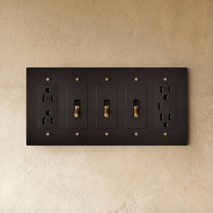 Custom brass light switch by Residence Supply, featuring a polished brass finish and vintage-style toggle design.