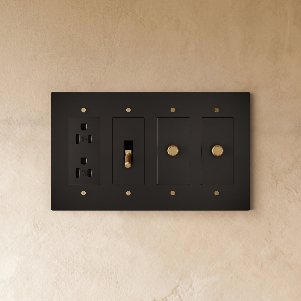 Custom brass light switch from Residence Supply with adjustable switch plates and vintage-style brass finish.