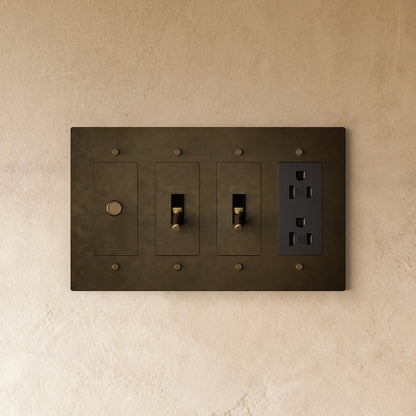 Custom brass light switch with build-your-own design, featuring vintage-style toggle and polished brass finish.