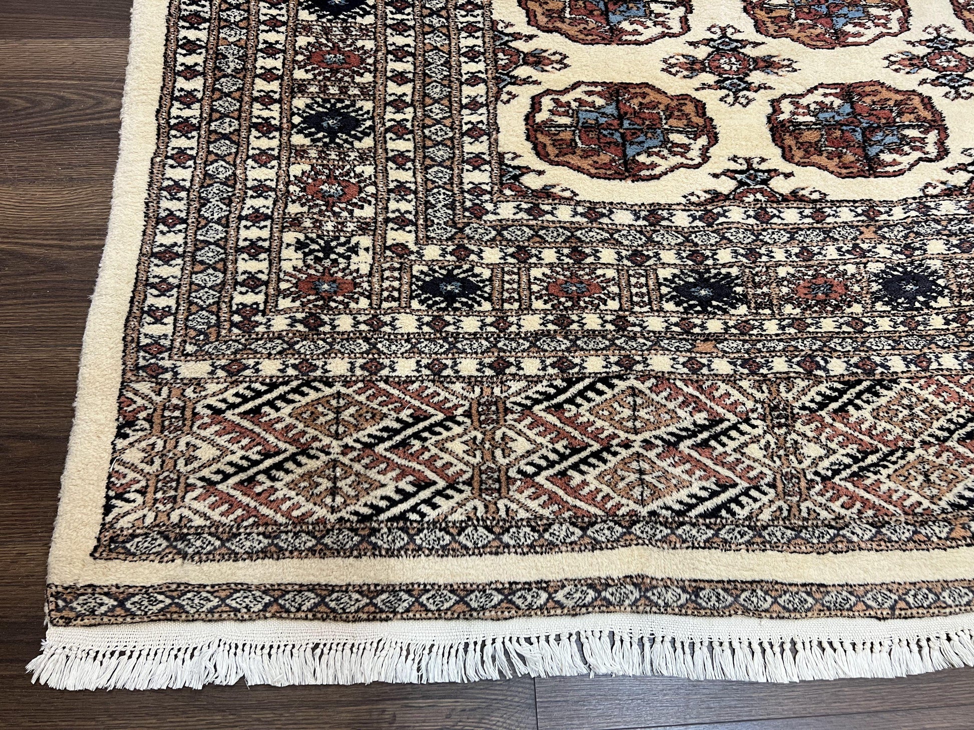 Pakistani Bokhara Rug 8x10, Traditional Turkoman Tribal Carpet, Allover Repeated Elephant Foot Motif, Ivory/Cream Black Red, Vintage Handmade - Nuvé