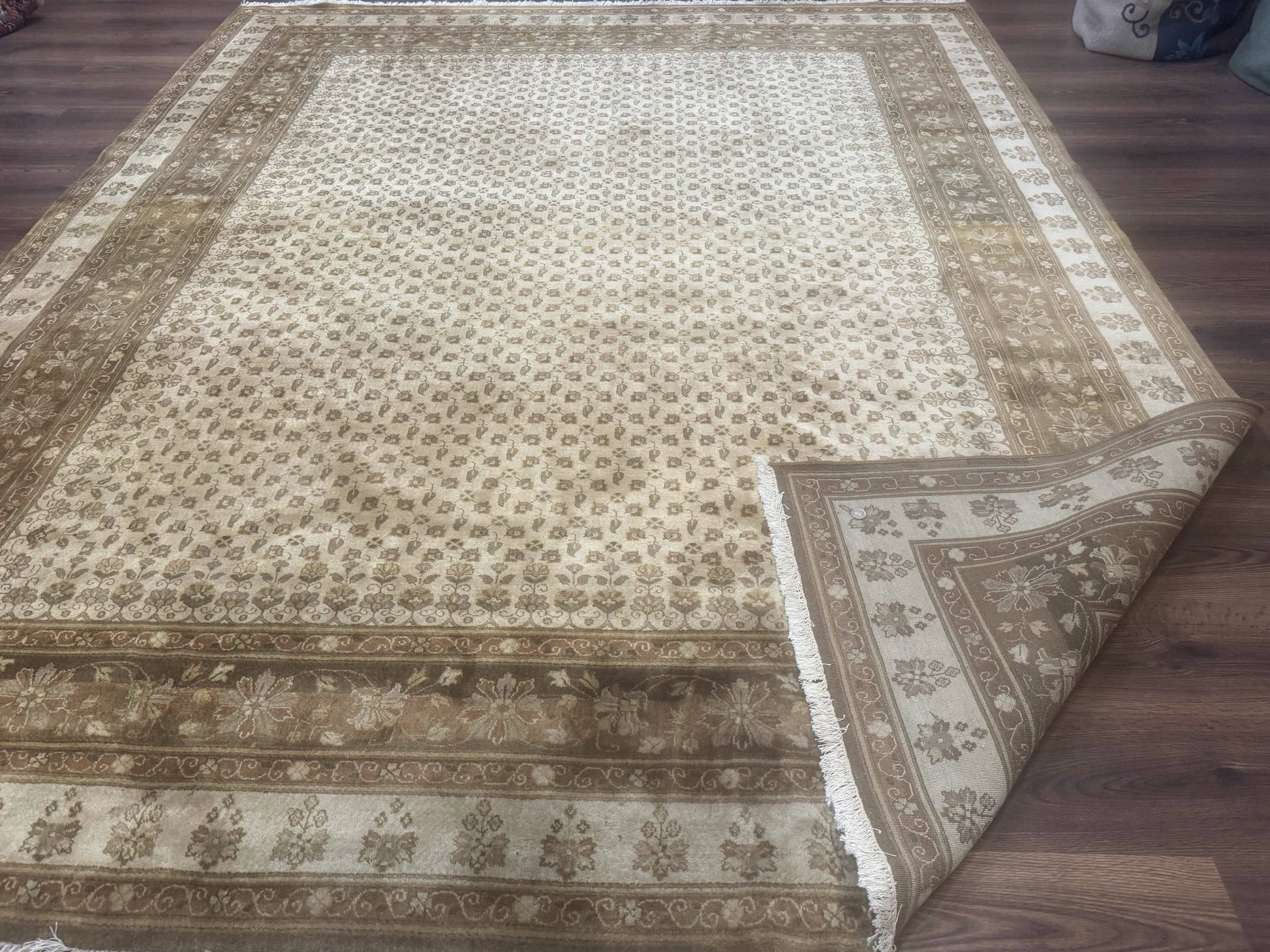 Beige handmade wool Indo Persian rug with allover pattern, 8x10 size, crafted by Jewel Rugs.
