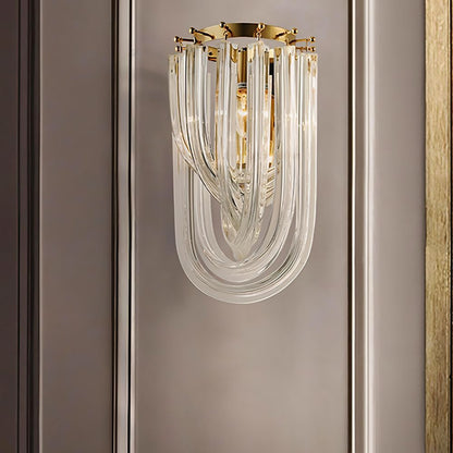 Danica Wall Lamp by Residence Supply, featuring sleek metal design with a modern finish and wall-mounted installation.