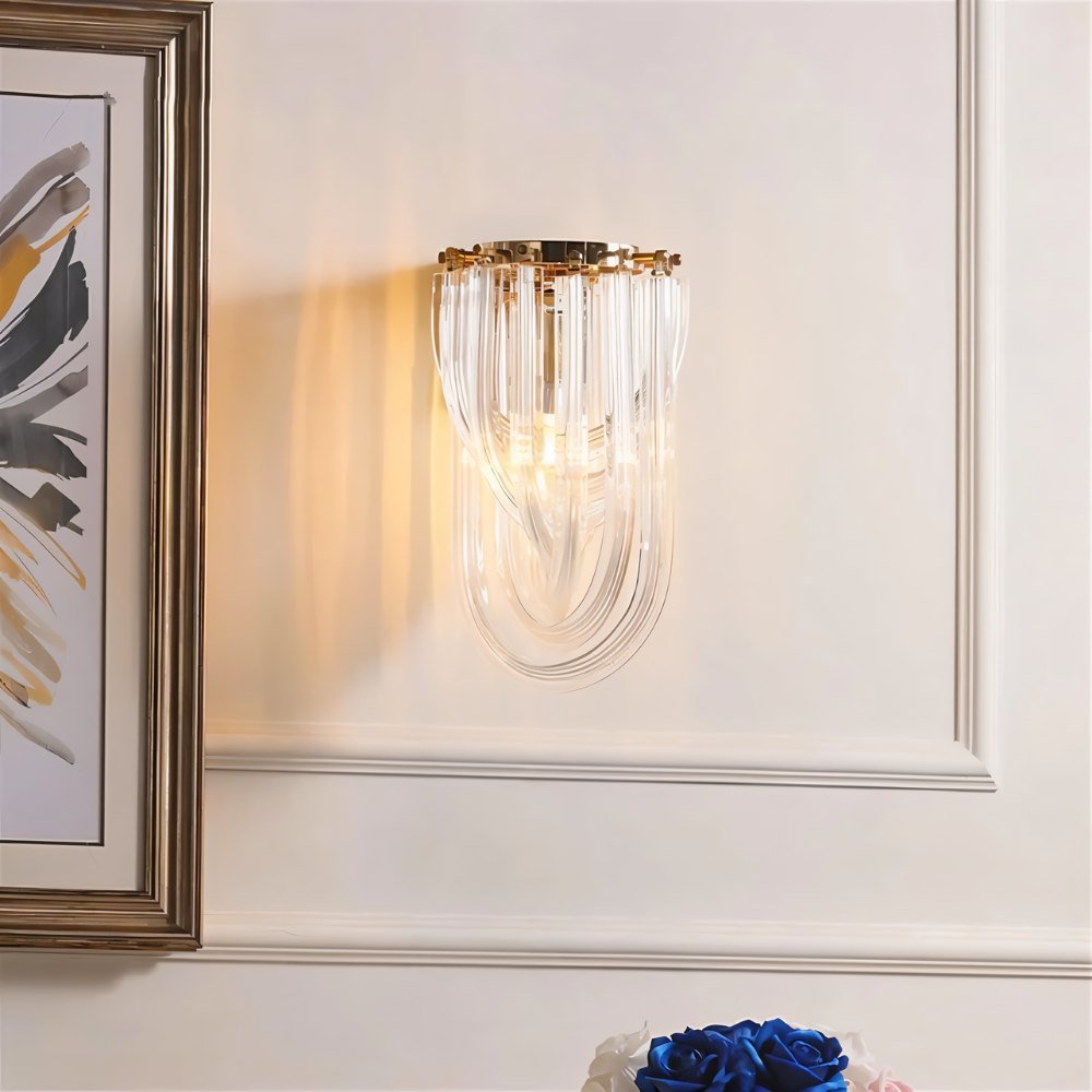 Danica Wall Lamp by Residence Supply featuring a modern design with a sleek metal finish and adjustable arm.