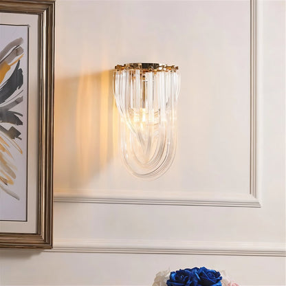Danica Wall Lamp by Residence Supply featuring a modern design with a sleek metal finish and adjustable arm.
