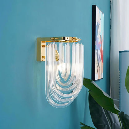 Danica Wall Lamp by Residence Supply featuring a sleek modern design with a metallic finish and adjustable arm for versatile lighting.