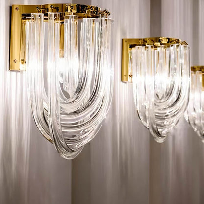 Danica Wall Lamp by Residence Supply featuring a sleek metal design and modern lighting fixture for stylish wall illumination.