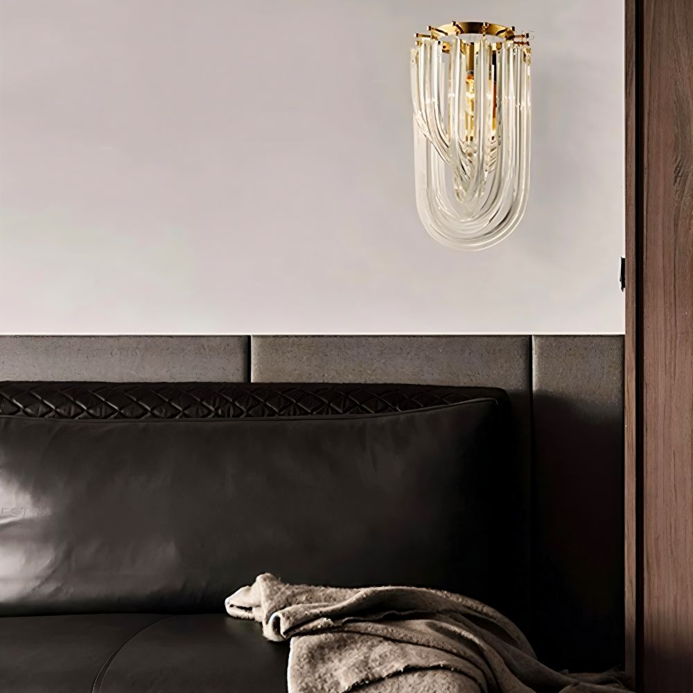 Danica Wall Lamp by Residence Supply featuring a sleek modern design with a metal arm and frosted glass shade.