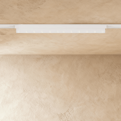 Modern Dawn Track Light System by Residence Supply with adjustable spotlights on a sleek track for versatile lighting.