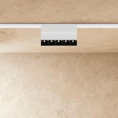 Dawn Track Light System by Residence Supply featuring adjustable spotlight heads mounted on a sleek track for modern lighting.