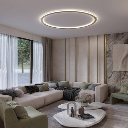 Modern Dayira ceiling light by Residence Supply featuring a sleek, round design with warm LED illumination.