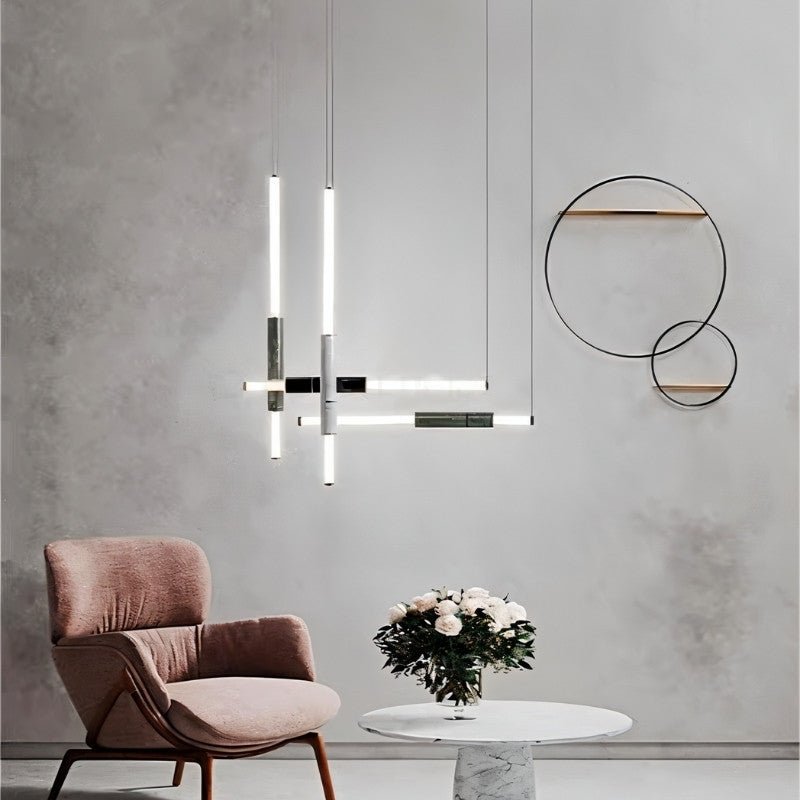 Modern Delia Pendant Light from Residence Supply hanging in a stylish living room with a sleek design and warm lighting.