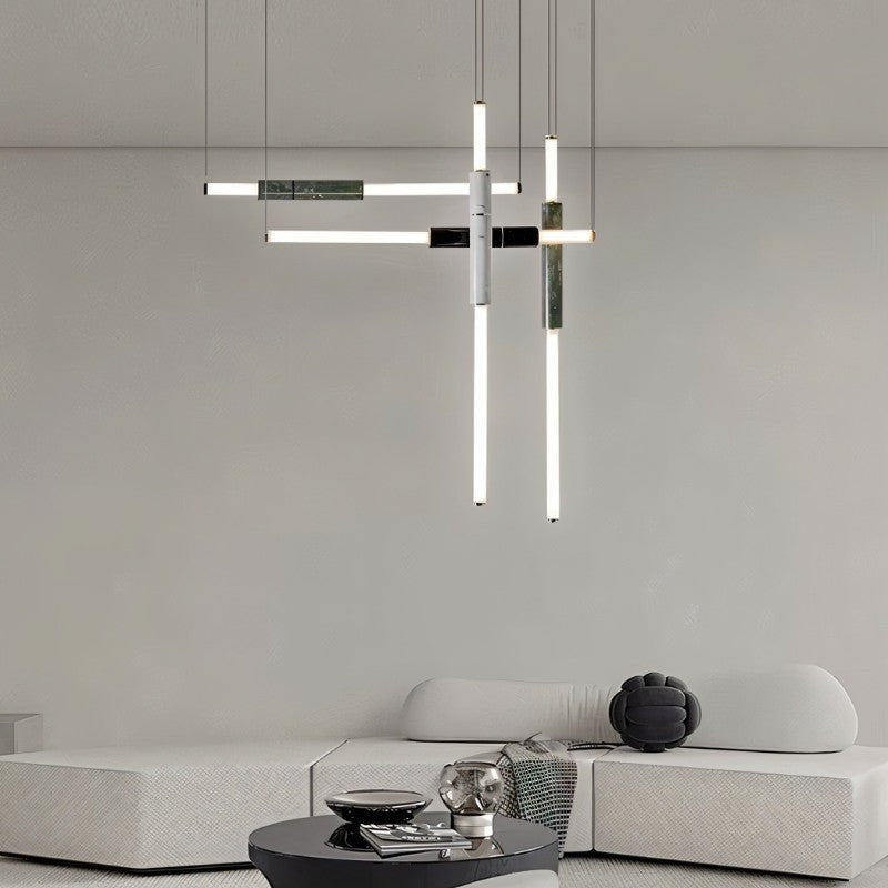 Modern Delia Pendant Light by Residence Supply hanging in a stylish living room with a sleek, minimalist design.