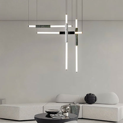 Modern Delia Pendant Light by Residence Supply hanging in a stylish living room with a sleek, minimalist design.