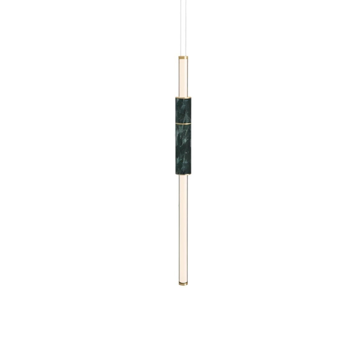 Modern vertical Delia Pendant Light by Residence Supply hanging from ceiling with sleek design and warm illumination.