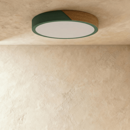 Delphi ceiling light by Residence Supply featuring a sleek modern design with a circular white fixture and metallic accents.