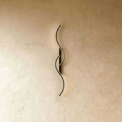 Modern Denisse Wall Lamp by Residence Supply featuring a sleek metal finish and stylish wall-mounted design.