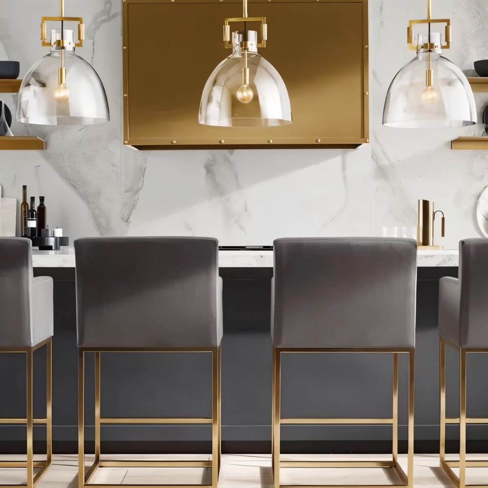 Modern Dennise Pendant Light by Residence Supply with sleek metal finish and clear glass shade hanging from a ceiling mount.