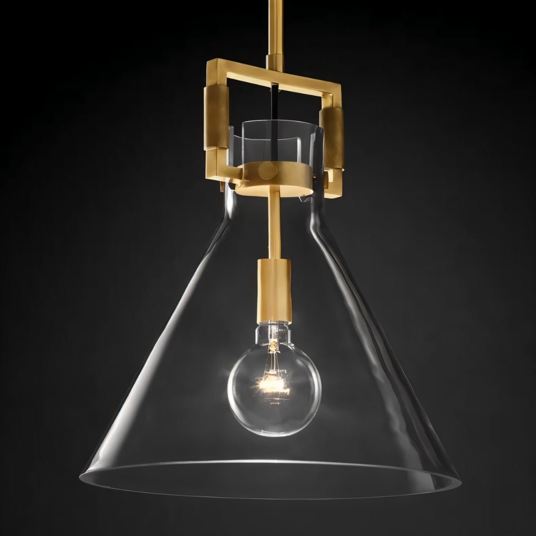 Dennise Pendant Light by Residence Supply hanging from ceiling with a sleek modern design and warm ambient lighting.