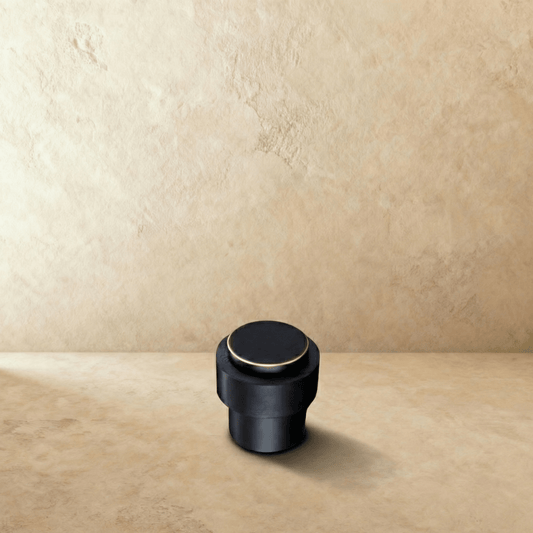 Residence Supply Desist Door Stop securing a door to prevent movement, made of durable material for home and garden door hardware.