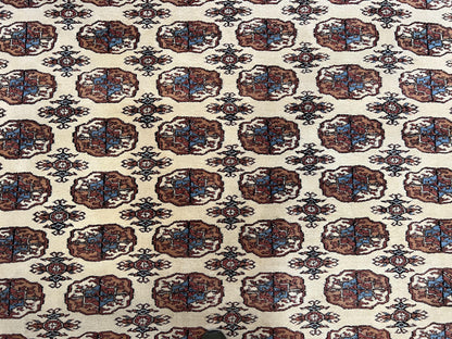 Pakistani Bokhara Rug 8x10, Traditional Turkoman Tribal Carpet, Allover Repeated Elephant Foot Motif, Ivory/Cream Black Red, Vintage Handmade - Nuvé