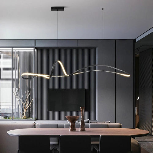 Diana pendant light by Residence Supply hanging from ceiling with metal and glass design, ideal for modern interior decor.