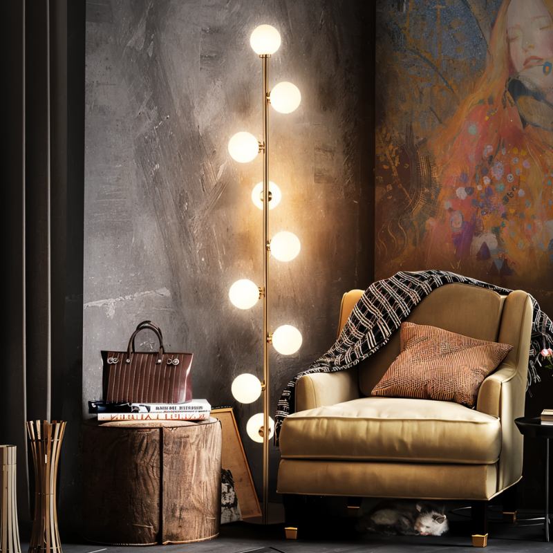 Modern Domena Floor Lamp by Residence Supply featuring a sleek, minimalist design with a metal stand and fabric lampshade.